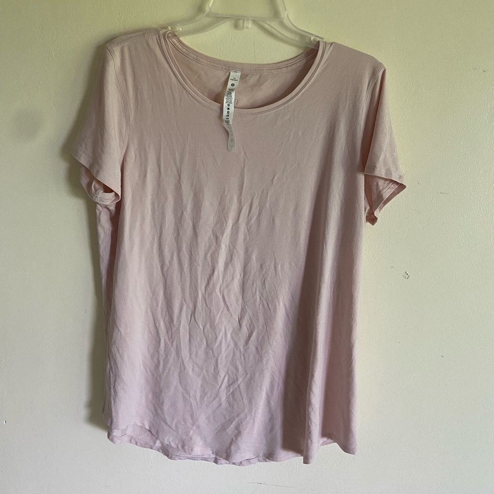 Lululemon size 12 pink workout/yoga t